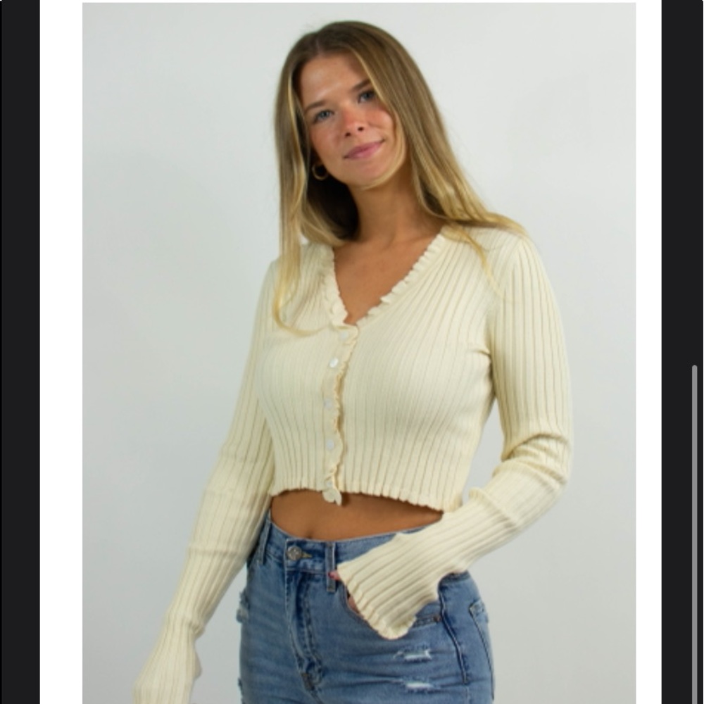 Cropped long sleeve button up sweater